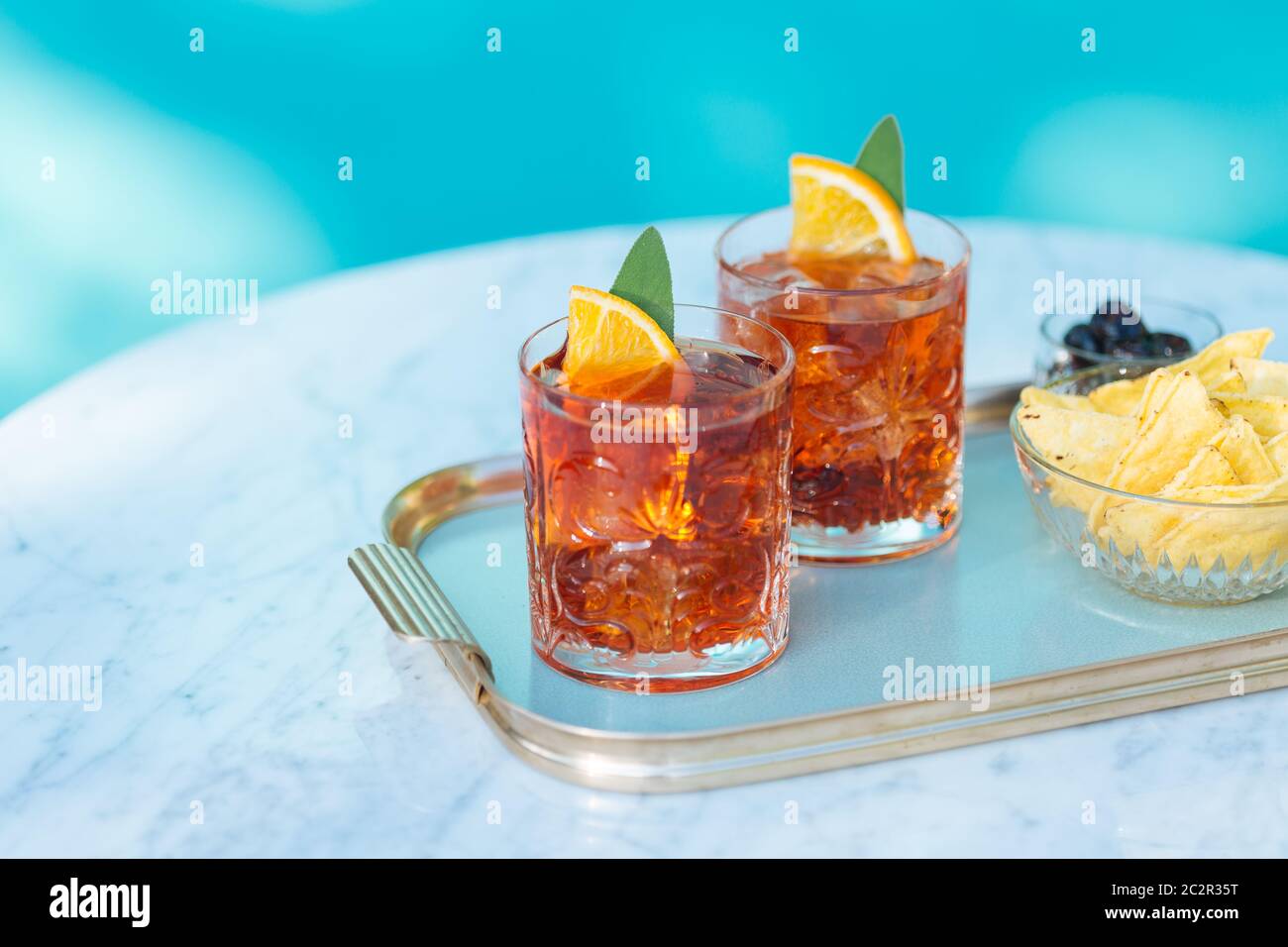 Negroni, an italian cocktail, an apéritif, first mixed in Firenze, Italy, in 1919. Count Camillo Negroni asked to strengthen his Americano Stock Photo