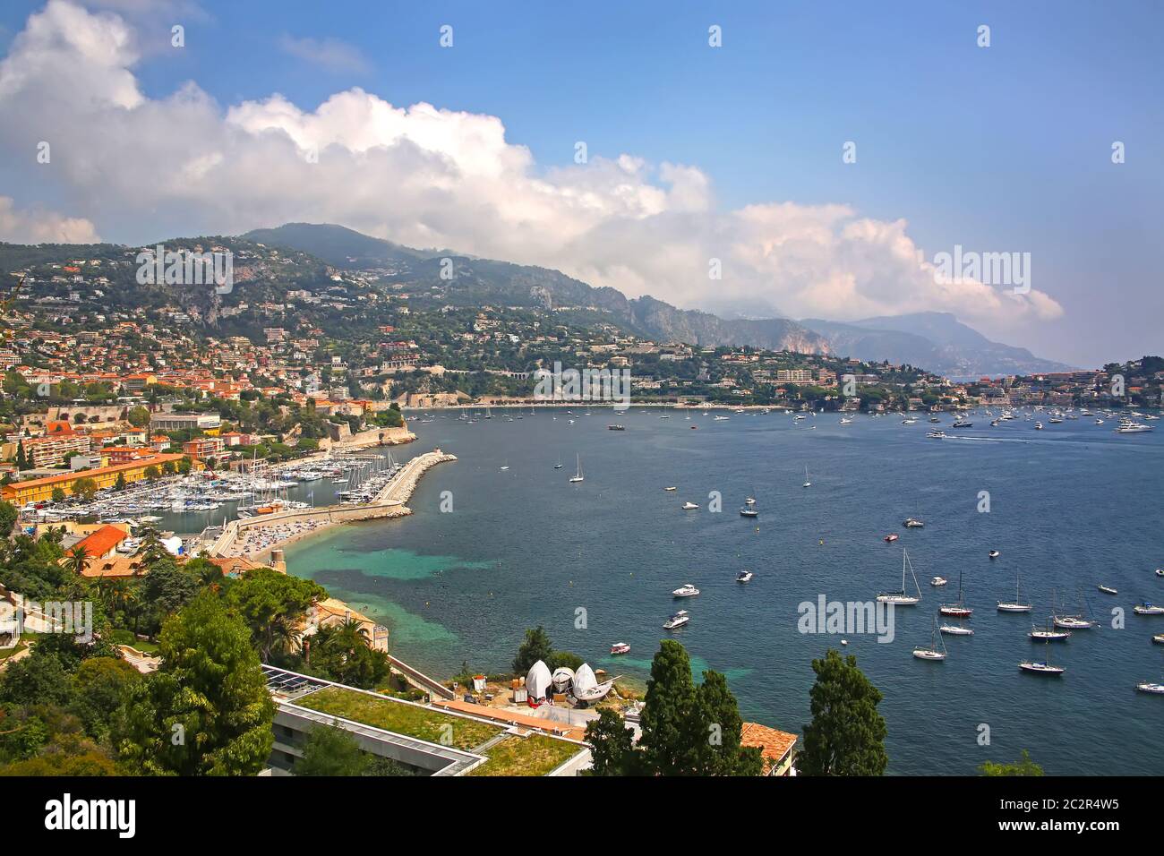 Beautiful view of the French riverira town of Villefranche sur Mer, on the coastline of the mediteranean sea, with a marina, tourist resort, France. Stock Photo