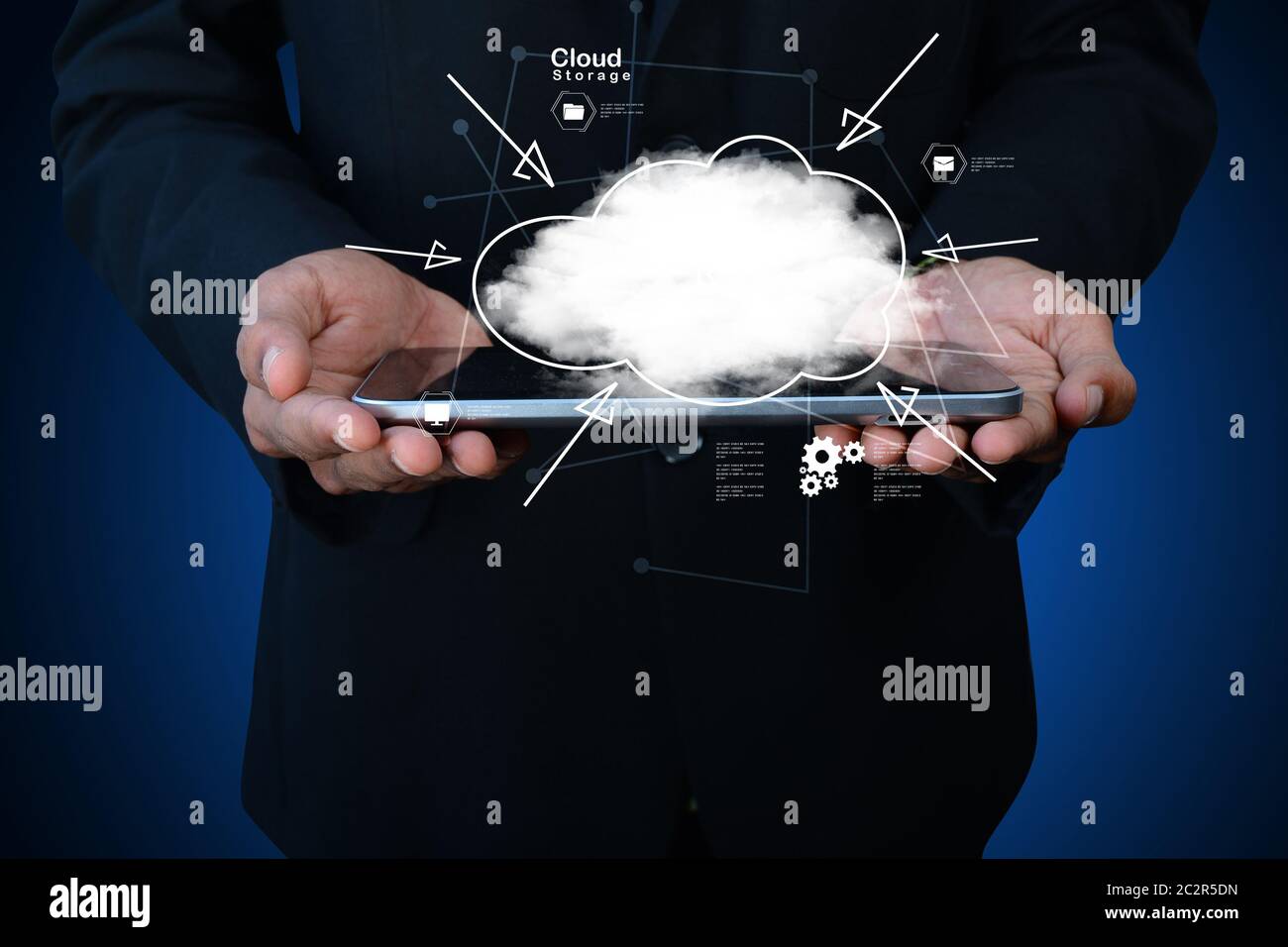 businessman holding cloud network icon on tablet computer Stock Photo