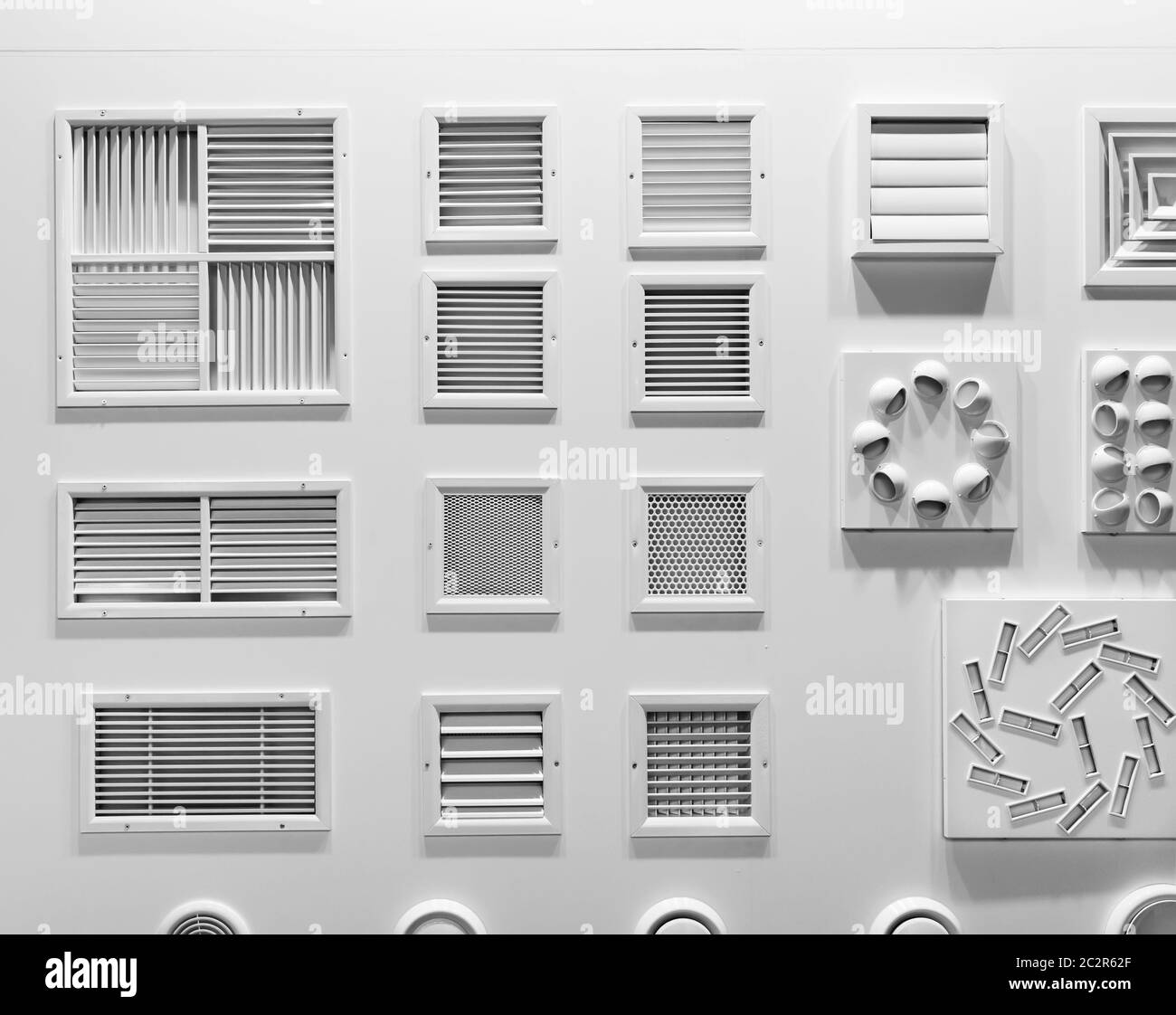 Showcase with plastic grills for house air vents closeup. Forced ventilation for bathroom, kitchen or rooms Stock Photo