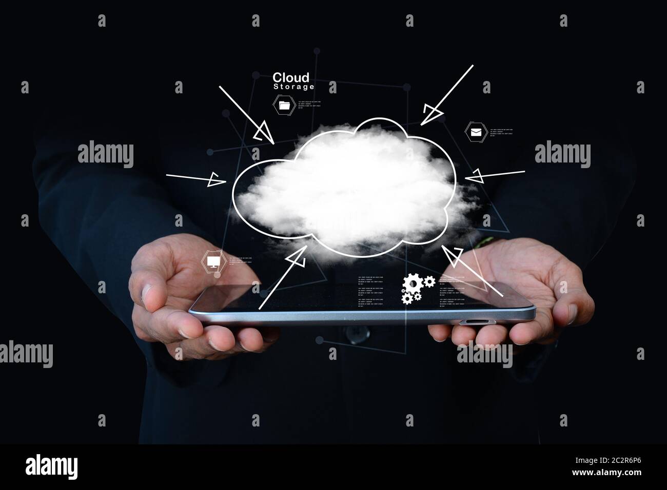 businessman holding cloud network icon on tablet computer Stock Photo