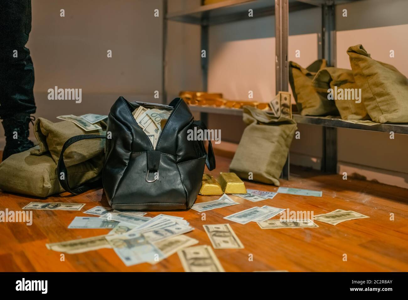 Bank robbery, bags full of money and gold, particular vault. Criminal profession, theft concept Stock Photo