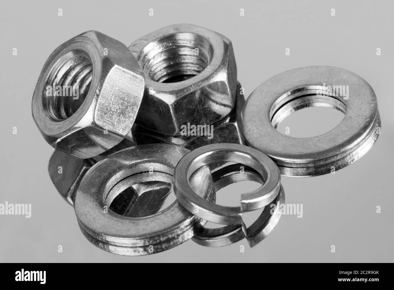Small industrial equipment - nuts and washers. Close-up Stock Photo