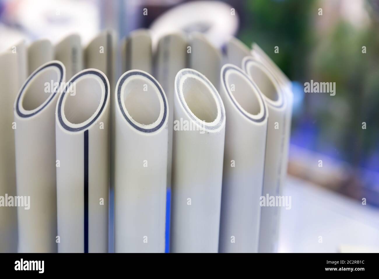 Plastic water pipes in a cut closeup, polypropylene tube, plumbing
