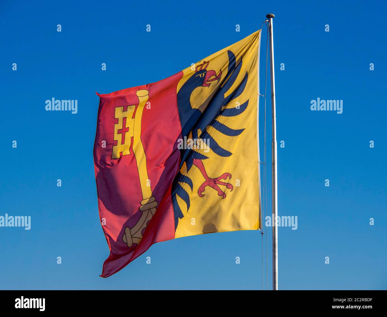 Geneva flag in the wind, Switzerland Stock Photo