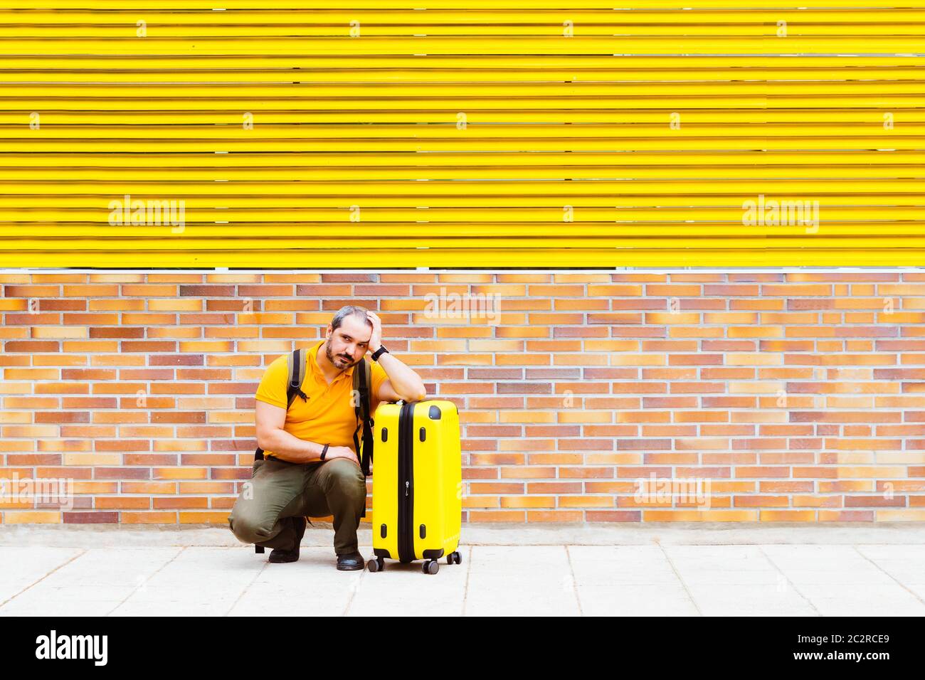 Person in orange shirt hi-res stock photography and images - Alamy