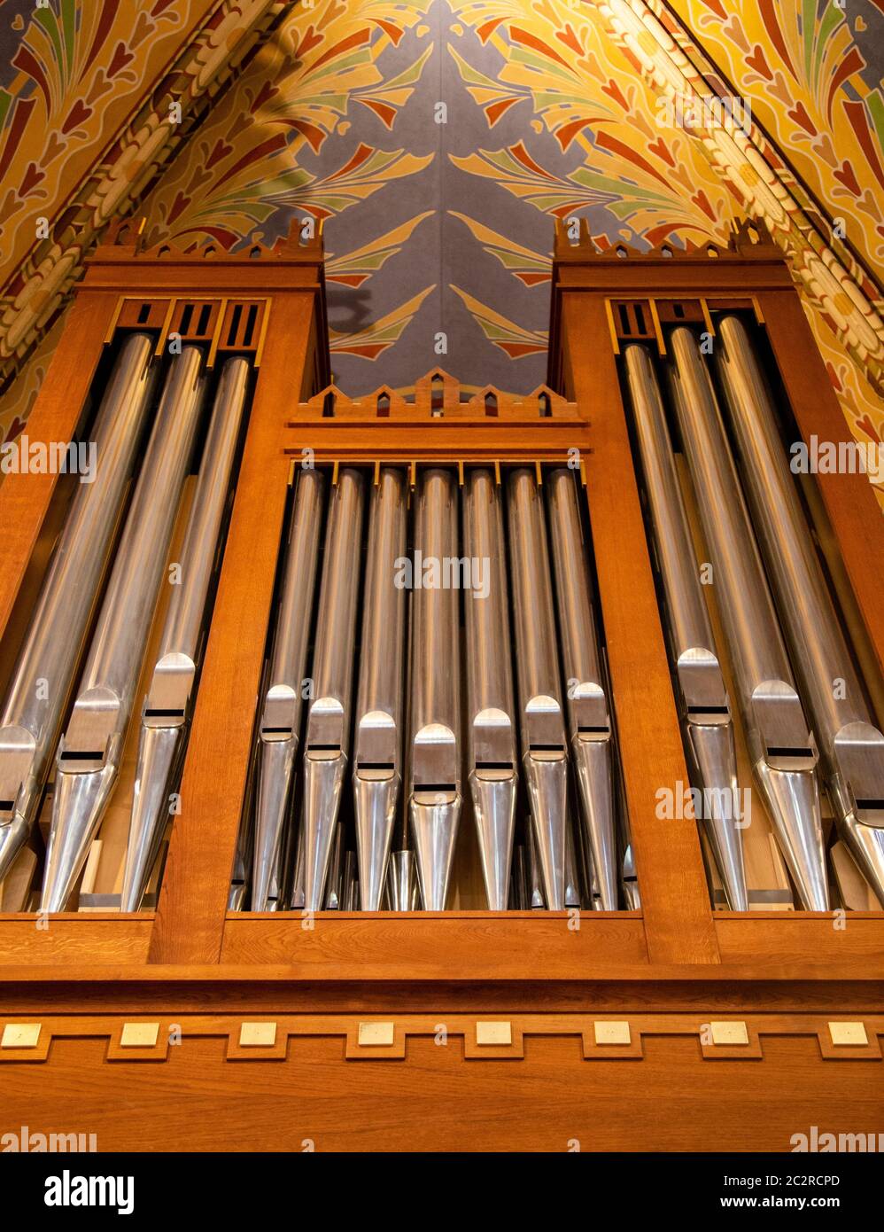 Pipe organ frontal shot, shiny silver prospect pipes pattern, row closeup. Sacral music, church musical service and classical or Stock Photo