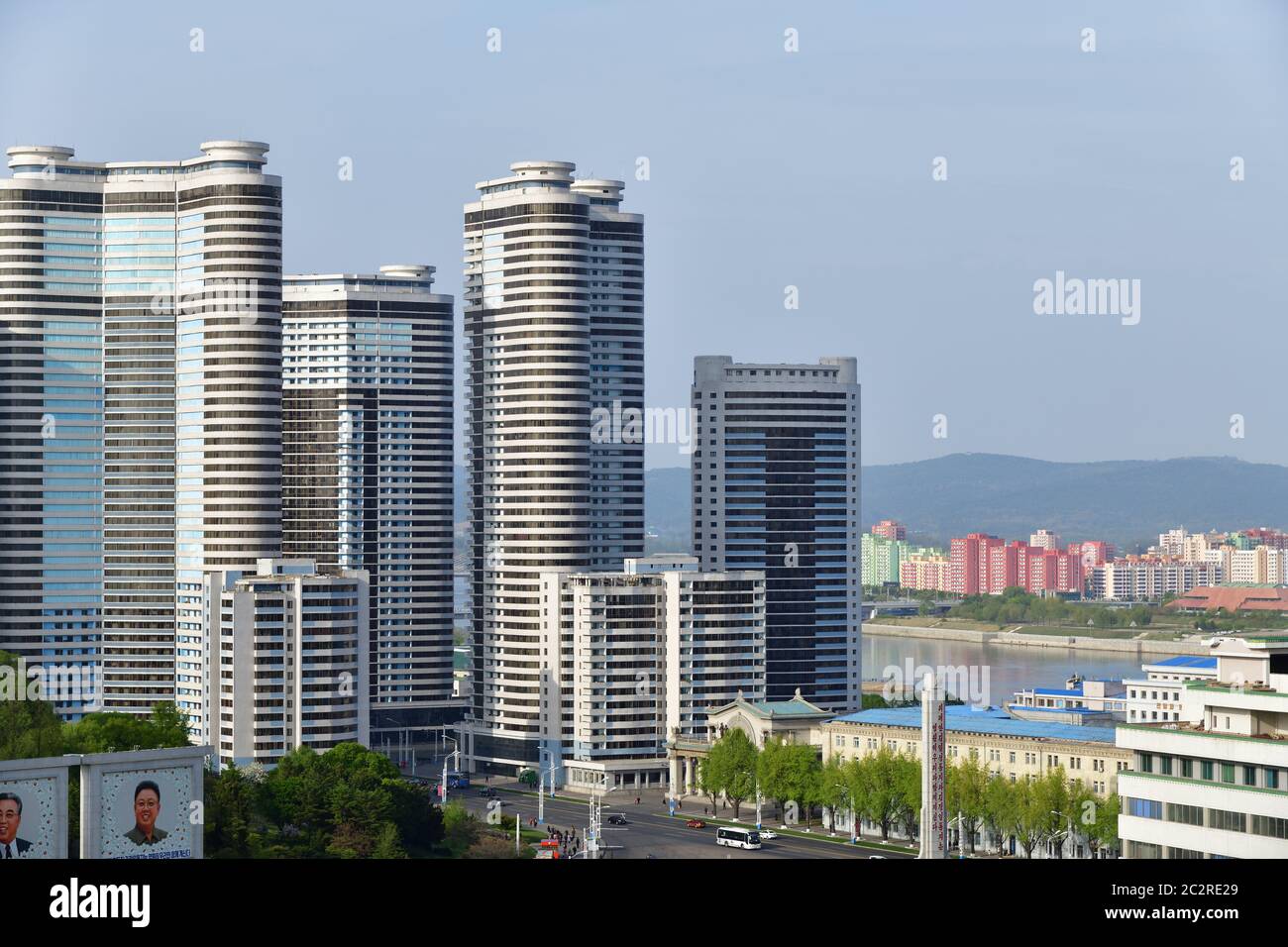 Pyongyang, North Korea - April 29, 2019: View of the downtown Pyongyang, new Mansudae residential district  and portraits of two former leaders of DPR Stock Photo