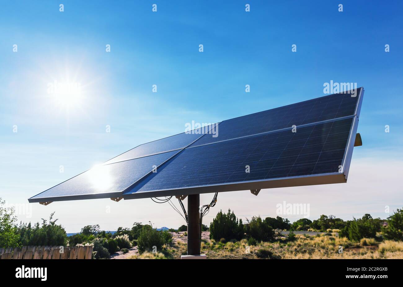 Blue solar panels against deep blue sky. Alternative energy technology ...