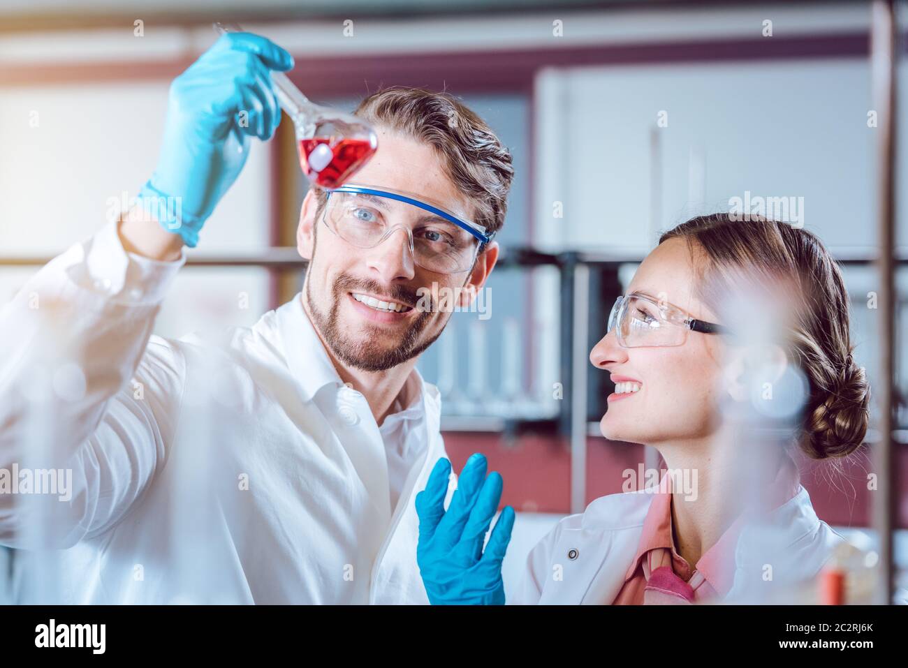 Scientists in the lab obtaining experimental data working diligently Stock Photo