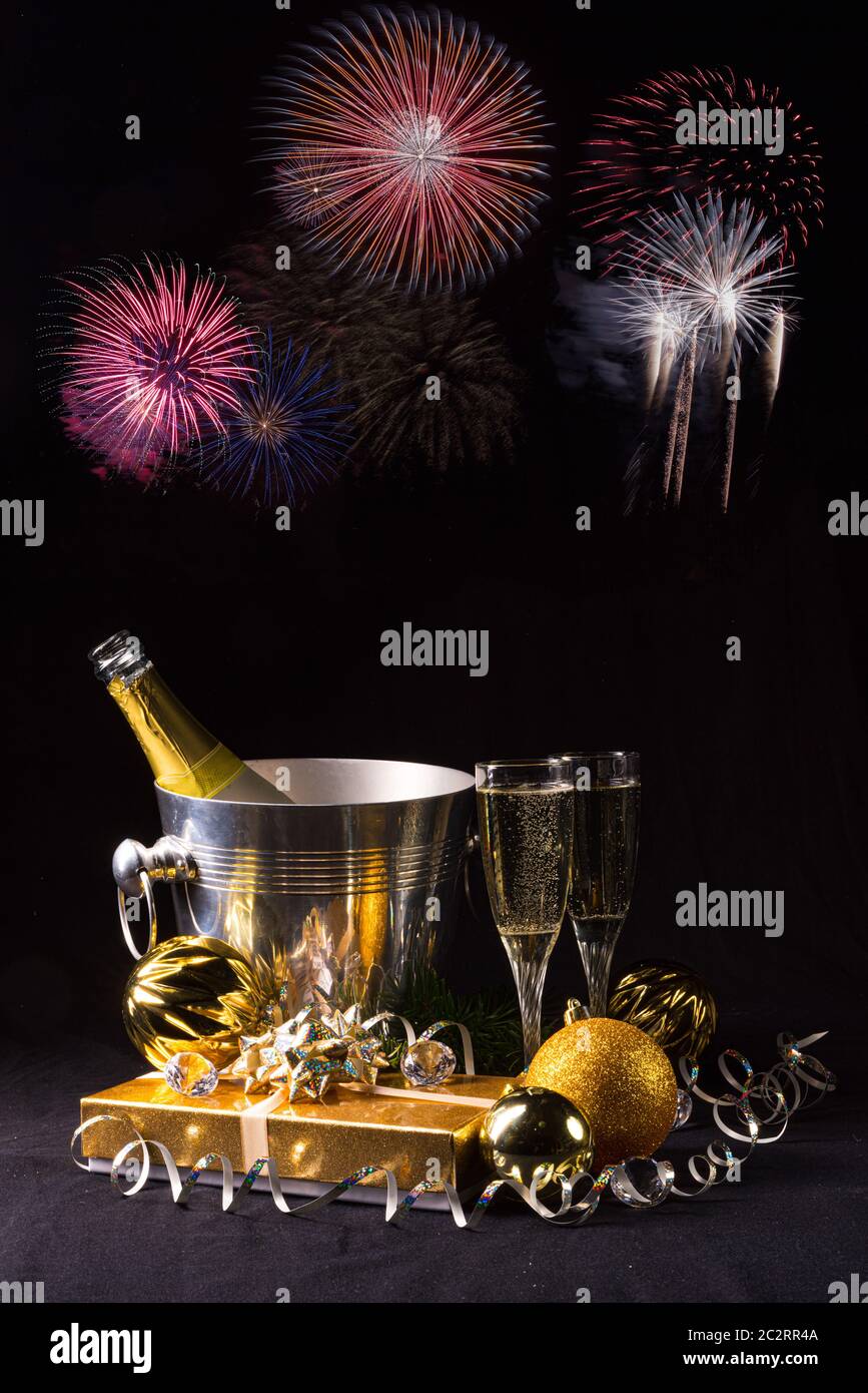 New Year's motives - clock, glasses and confetti Stock Photo