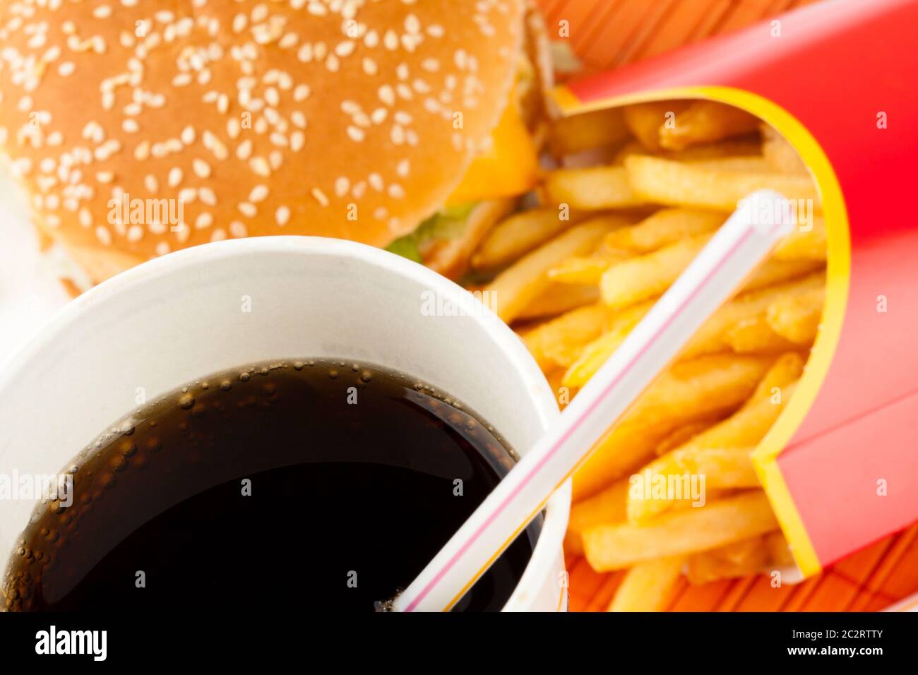 Fast food set of fried potatoes, burger and cola Stock Photo - Alamy