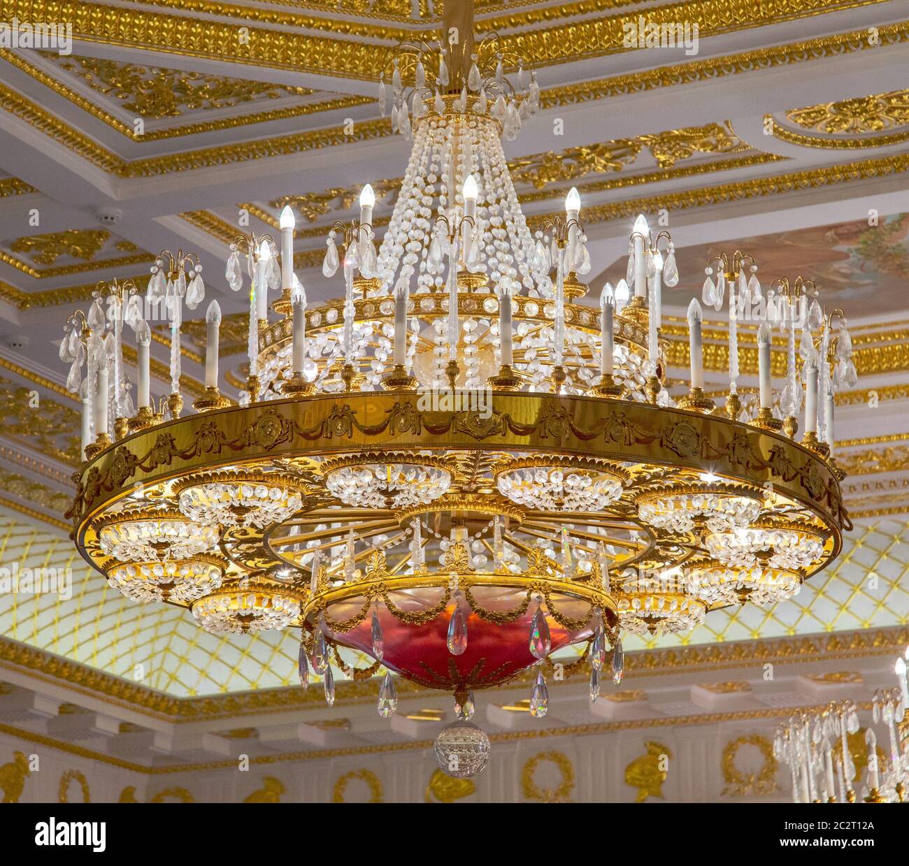 Moscow, Russia, 23 October 2019: Big bronze chandelier in Tavrichesky hall interior in State historical and architectural museum Stock Photo