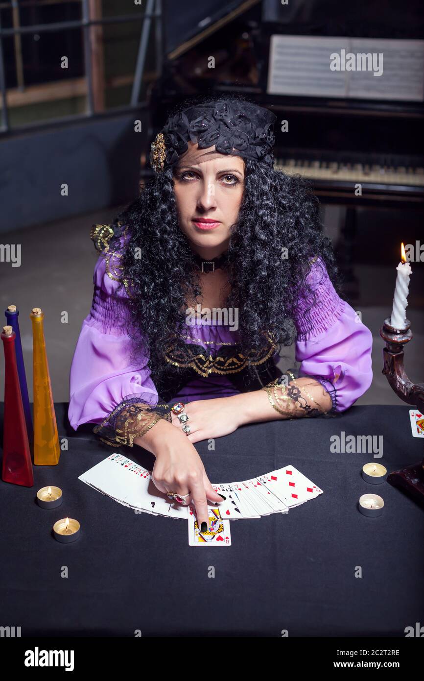 Close up of sorceress telling fortunes using cards Stock Photo Alamy