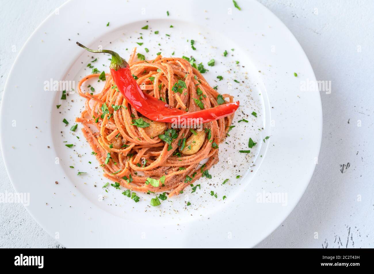 Pasta Aglio, Olio e Peperoncino italian pasta with garlic, chili pepper and olive oil Stock