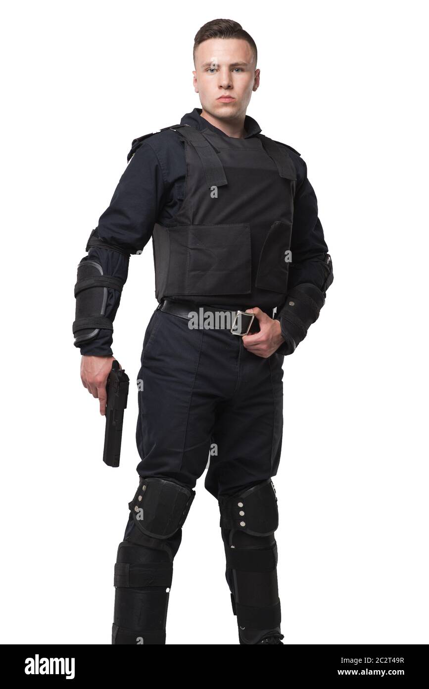 Armed special force soldier in black uniform and body armor, white ...