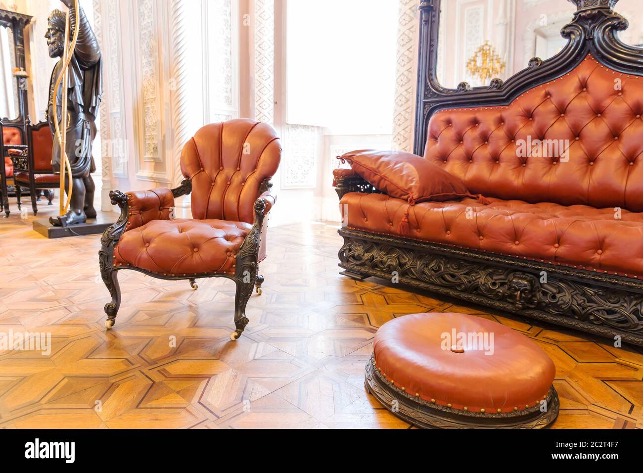Room with luxurious vintage leathercovered furniture Stock Photo Alamy