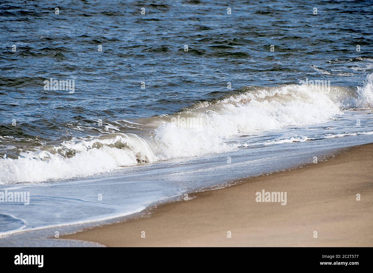 Waves Hitting the Beach Stock Photo