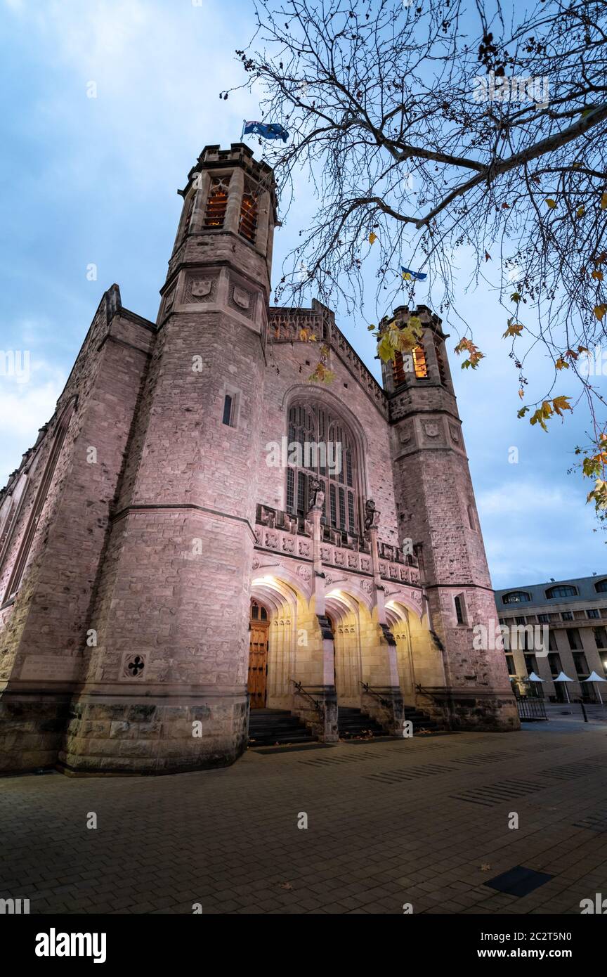 University of Adelaide's historic Bonython Hall illuminated at night on a cloudy day Stock Photo