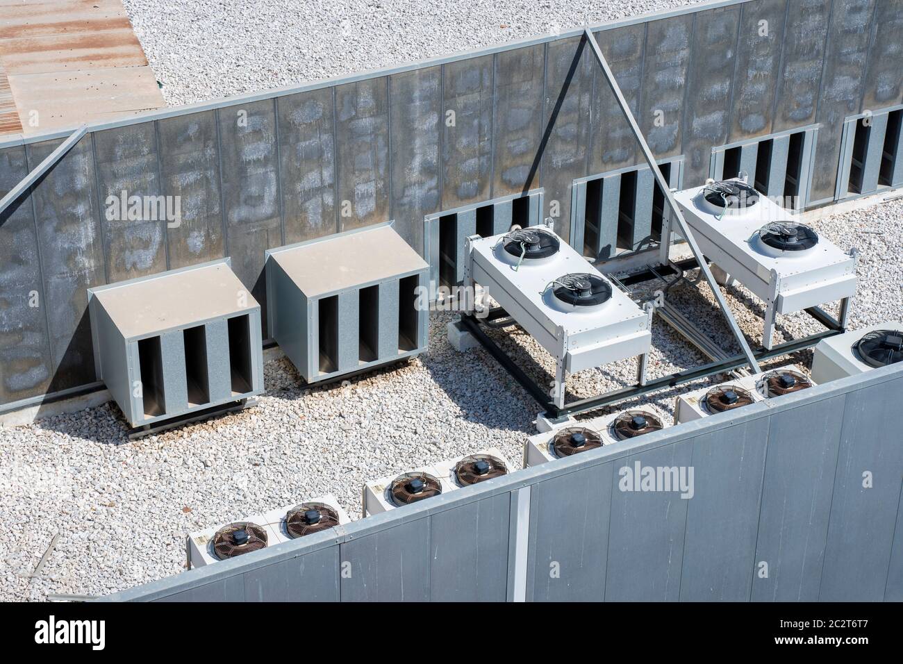 Equipment of industrial air conditioner units surrounded by a quiet