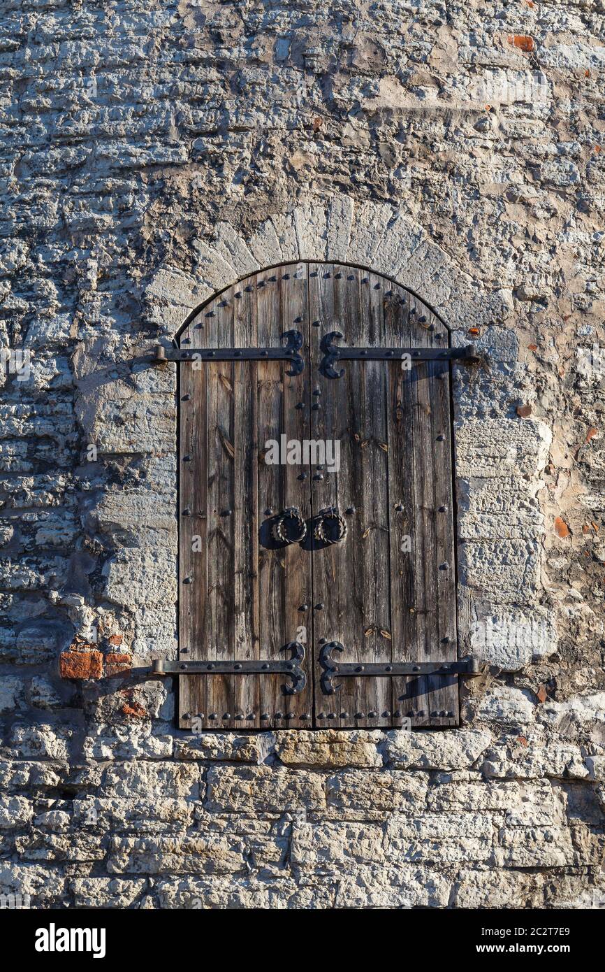 Medieval doors on stronghold tower made from limestone Stock Photo Alamy