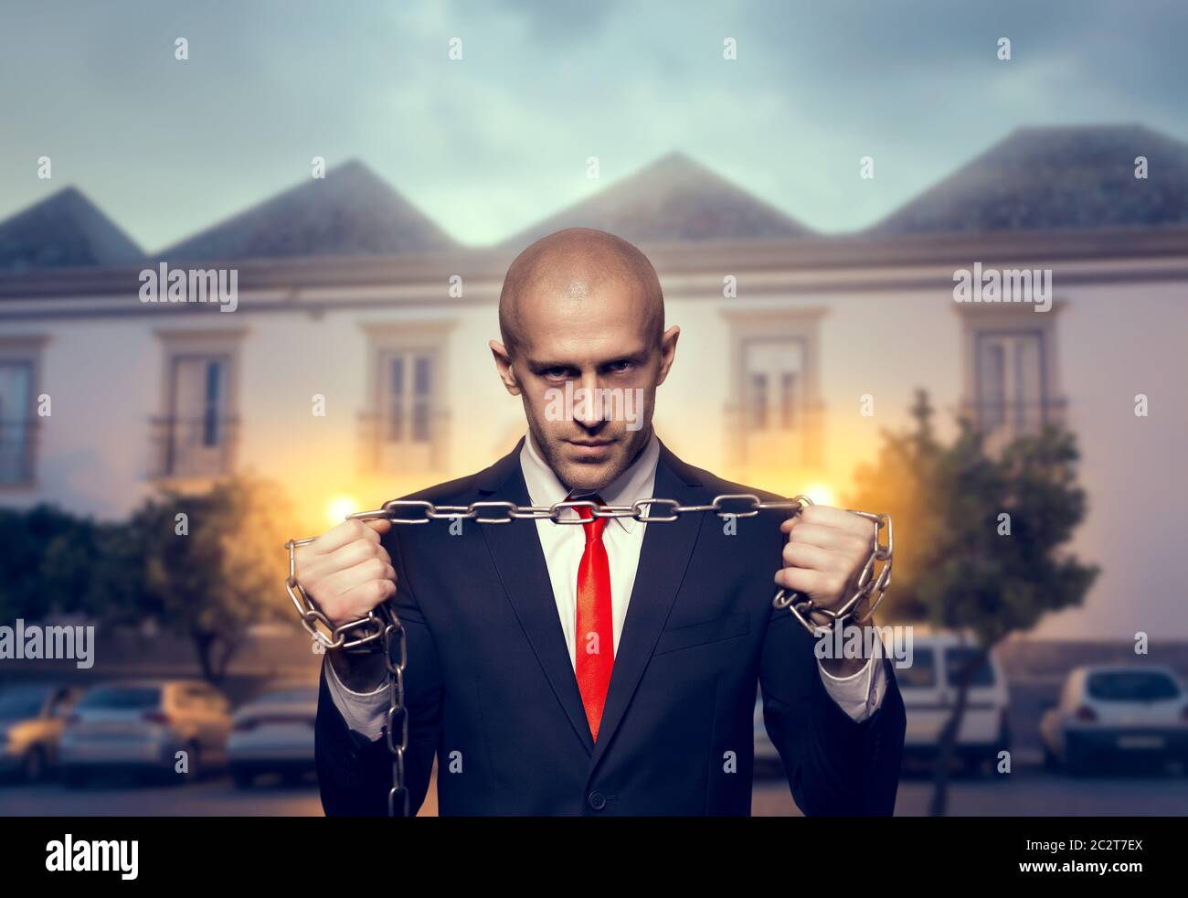 Silent killer with iron chain in hands wallpaper, background or poster  concept. Assassin in suit and red tie. Professional secret agent. Silencer  man Stock Photo - Alamy