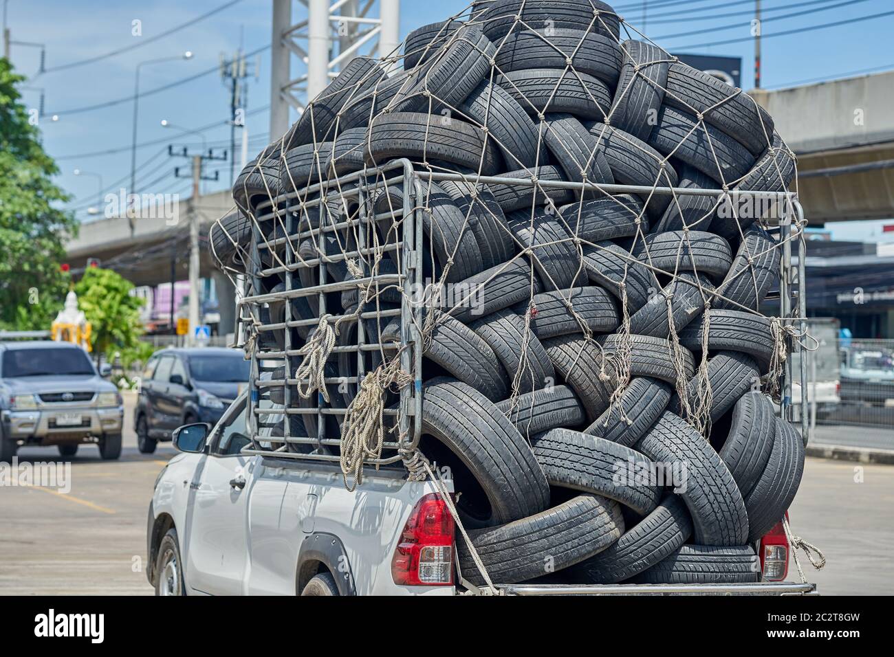 A truck full of used car tires Stock Photo - Alamy