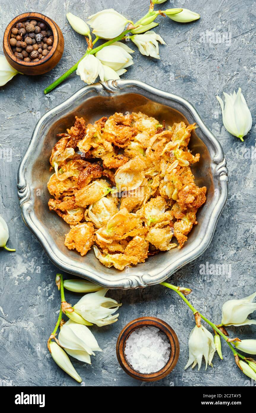 Fried yucca flowers.An unusual dish of edible flowers Stock Photo Alamy