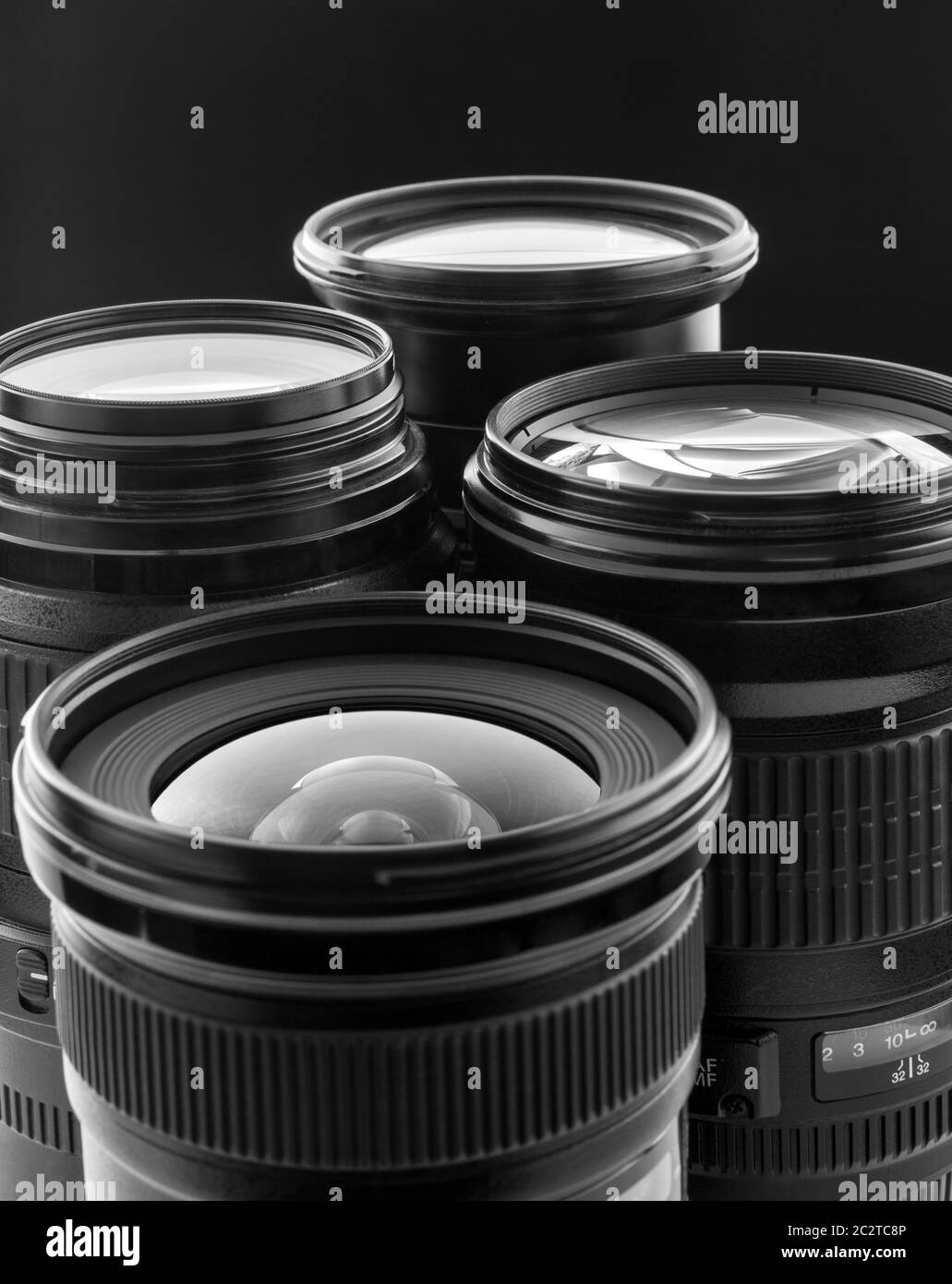 Four digital camera lenses. Closeup view Stock Photo