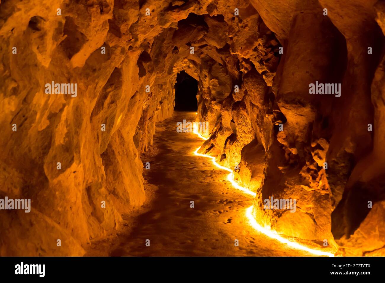 Underground cave with artificial lights down Stock Photo Alamy