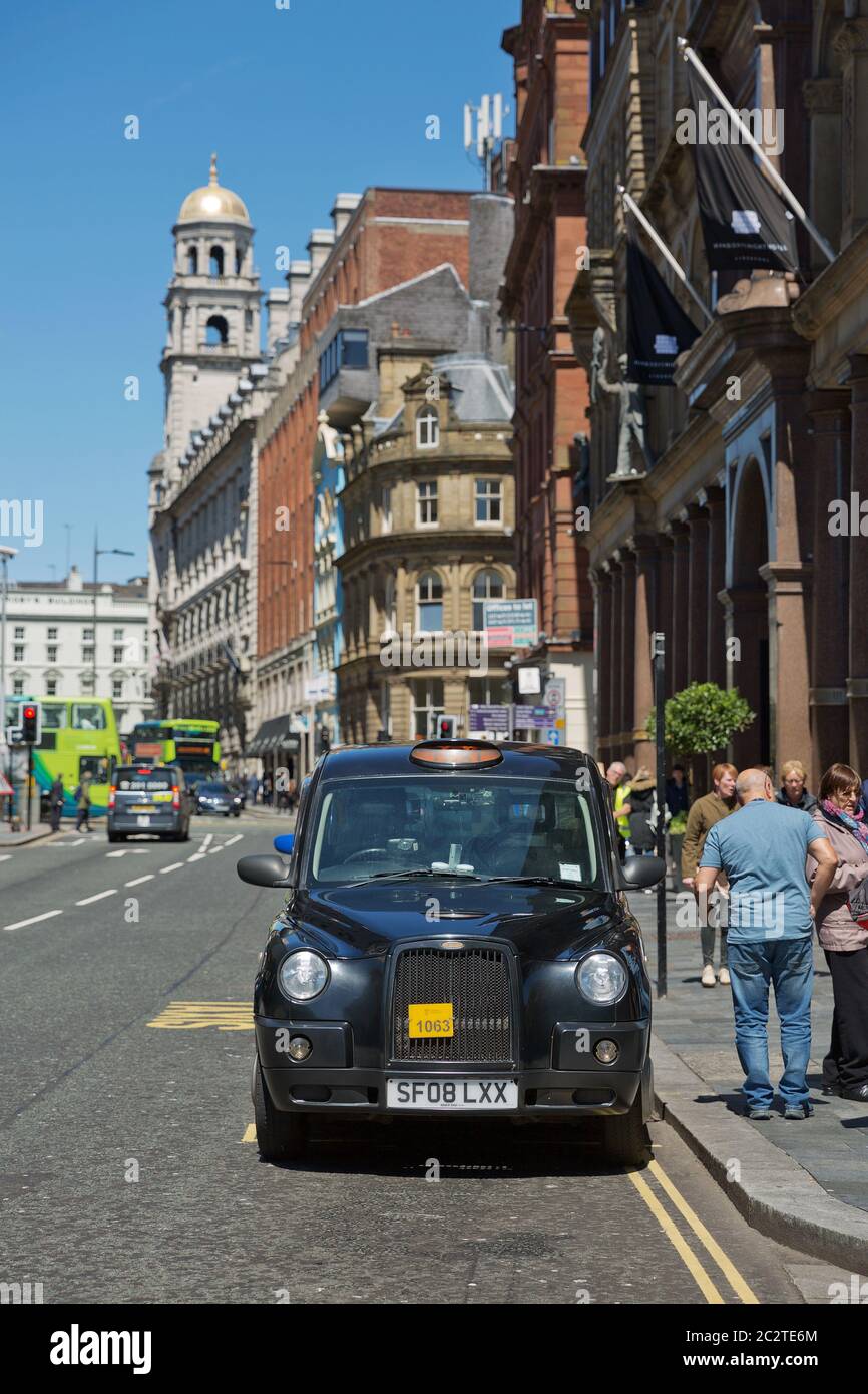 Britsh vintage taxi cab on the streets of Liverpool Stock Photo