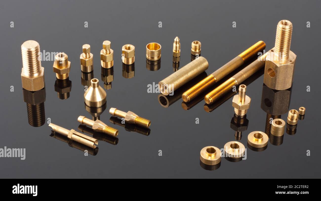 Set of brass mechanical spare parts Stock Photo Alamy