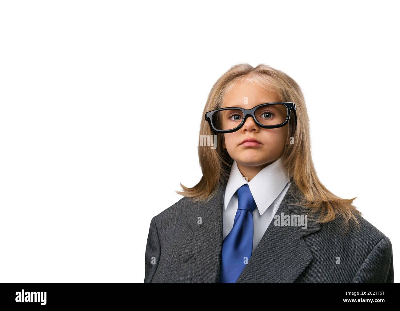 Little serious girl in funny spectacles isolated on white background