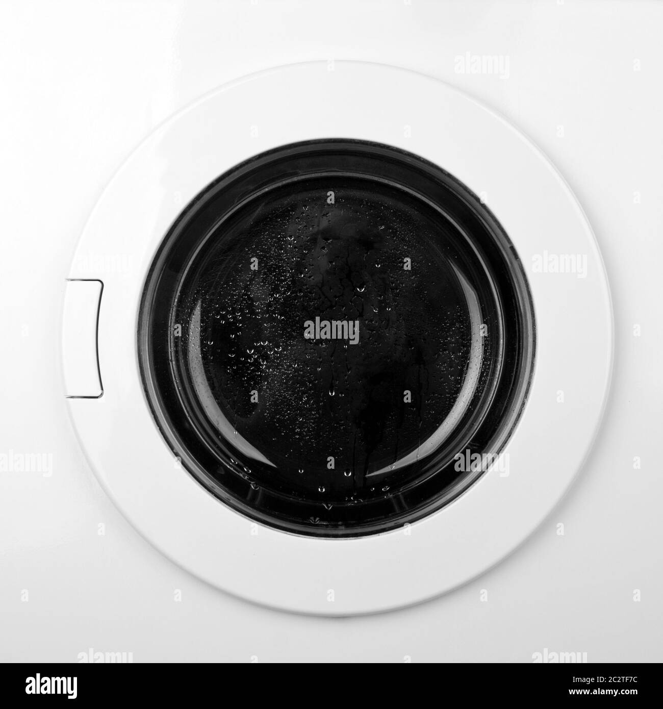 Closeup of washing machine door. In B/W Stock Photo Alamy