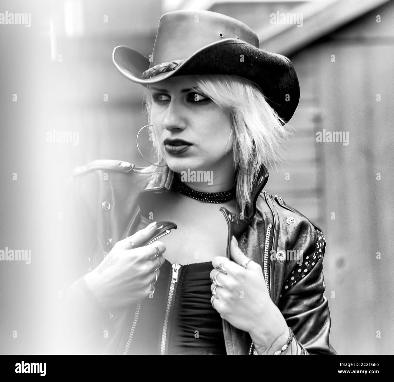 Black and white photo of a young woman with a cowboy hat Stock Photo ...