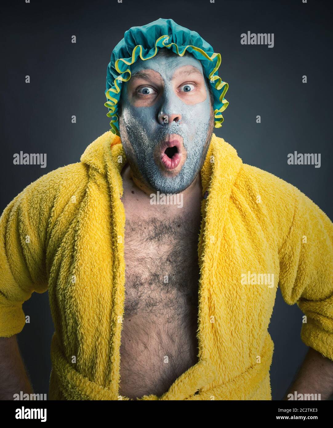 Surprised crazy man with face pack Stock Photo