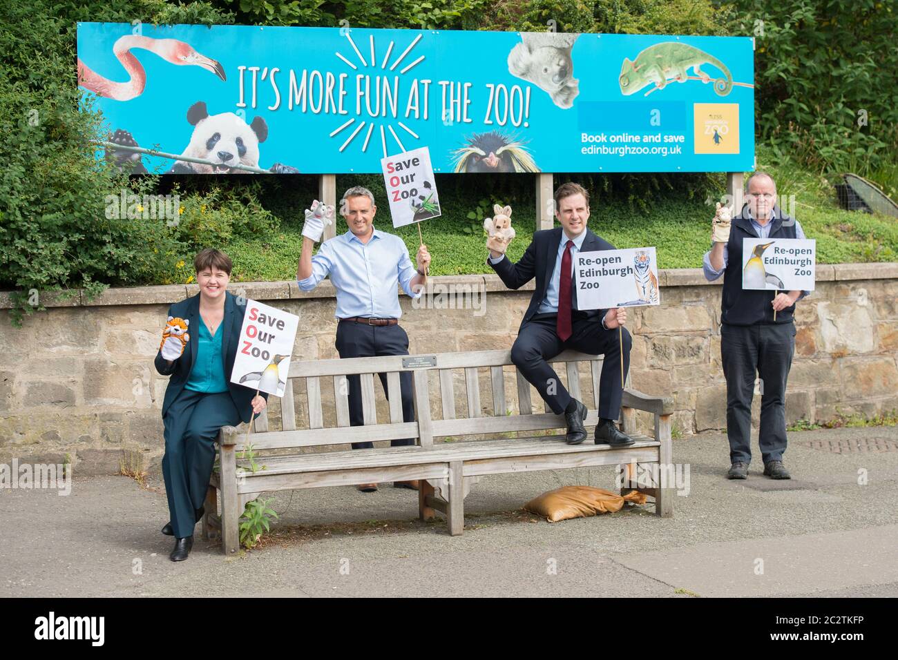 Edinburgh, Scotland, UK. , . Pictured: (left-right) Edinburgh MSPs: Ruth Davidson, Alex Cole-Hamilton, Daniel Johnson and Andy Wightman, seen campaigning on the steps of the zoo with posters and animal puppets for the safe re-opening of Edinburgh Zoo as part of phase 2 easing of lockdown restrictions. Credit: Colin Fisher/Alamy Live News Stock Photo