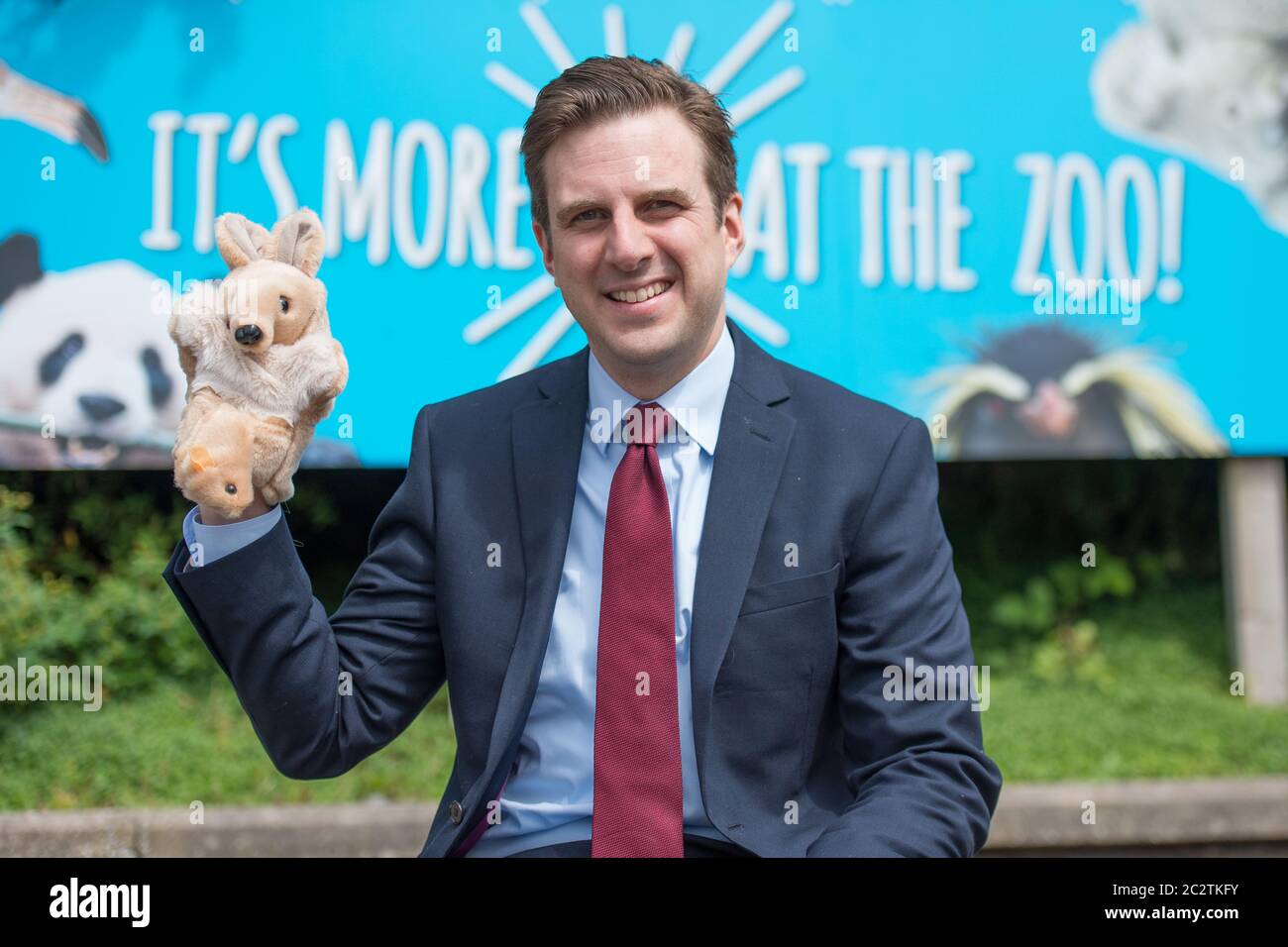 Edinburgh, Scotland, UK. , . Pictured: Daniel Johnson MSP of the Scottish Labour Party seen campaigning on the steps of the zoo with posters and animal puppets for the safe re-opening of Edinburgh Zoo as part of phase 2 easing of lockdown restrictions. Credit: Colin Fisher/Alamy Live News Stock Photo