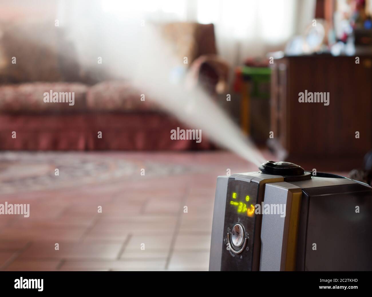 Digital humidifier with ionic air purifier at home interior Stock Photo Alamy