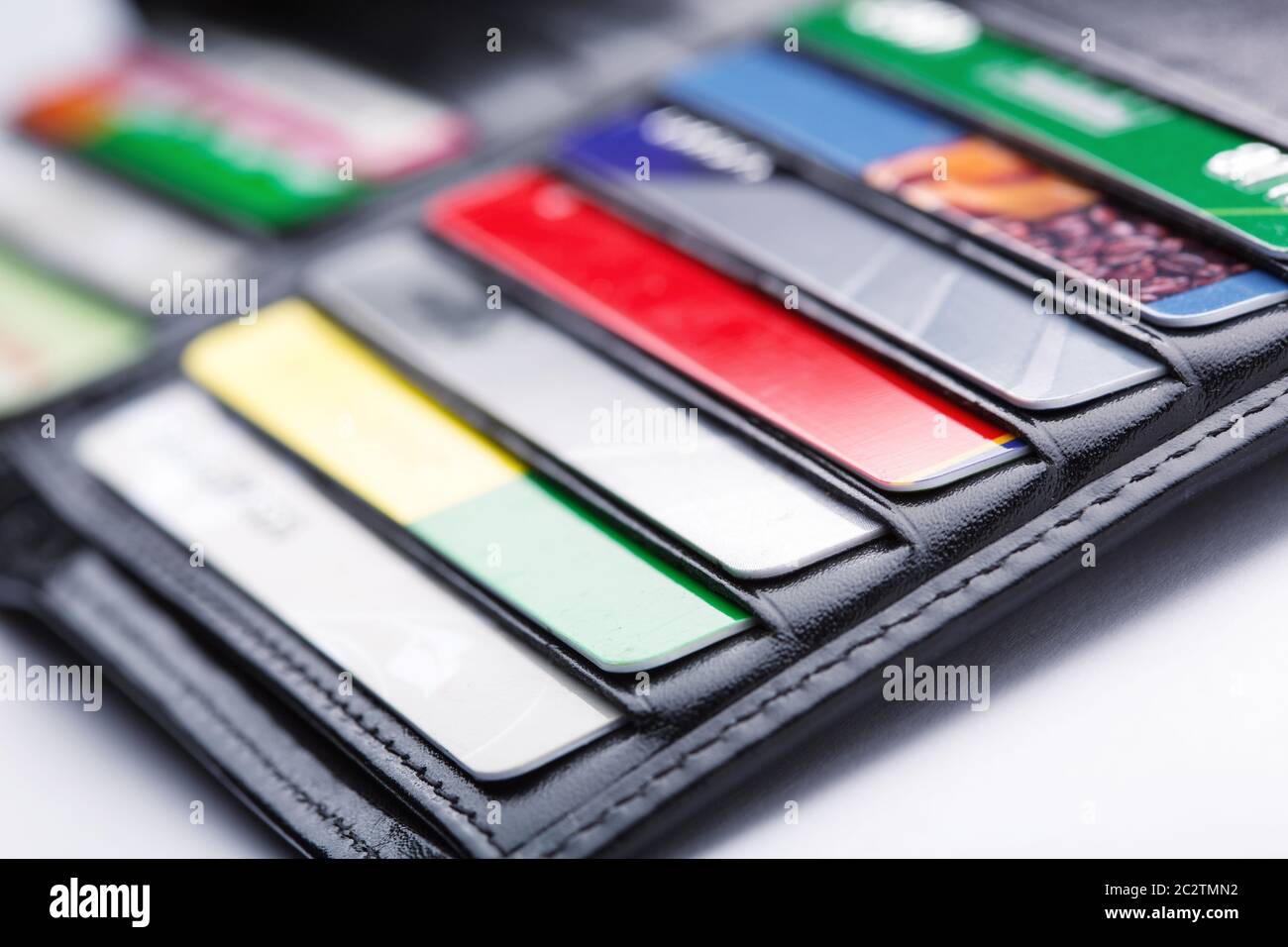 Black leather wallet with credit and discount cards Stock Photo