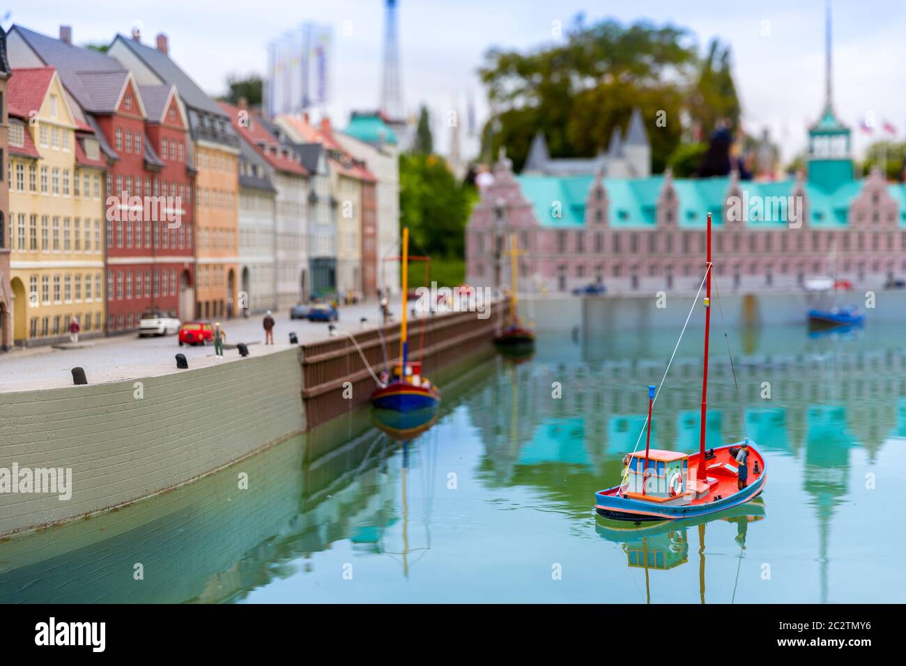 Fishing boat, cars and people on pier miniature scene outdoor, europe. Mini  figures with high detaling of objects, realistically diorama Stock Photo -  Alamy