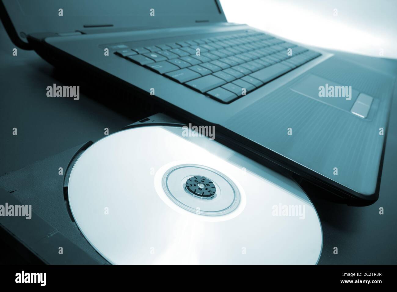 Laptop with open CD - DVD drive Stock Photo