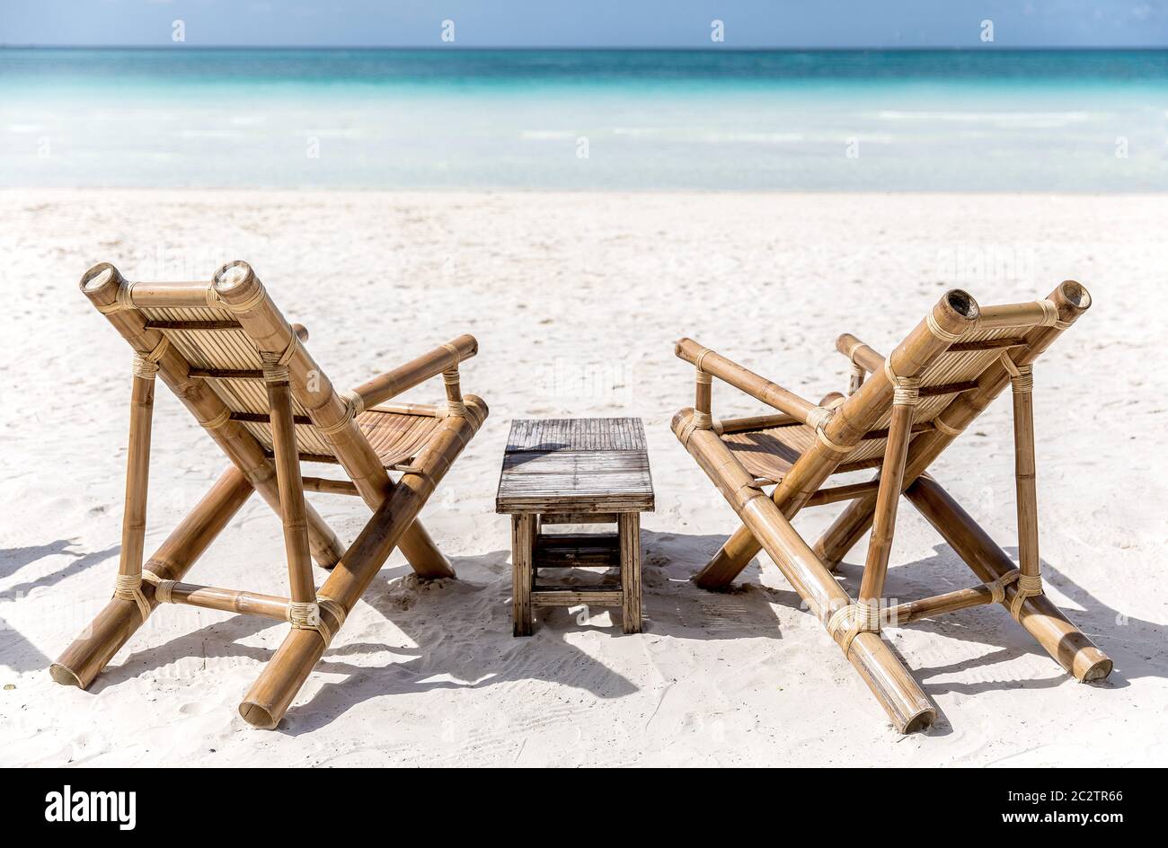 bamboo seating chairs on white beach, borocay island, Philippines Stock