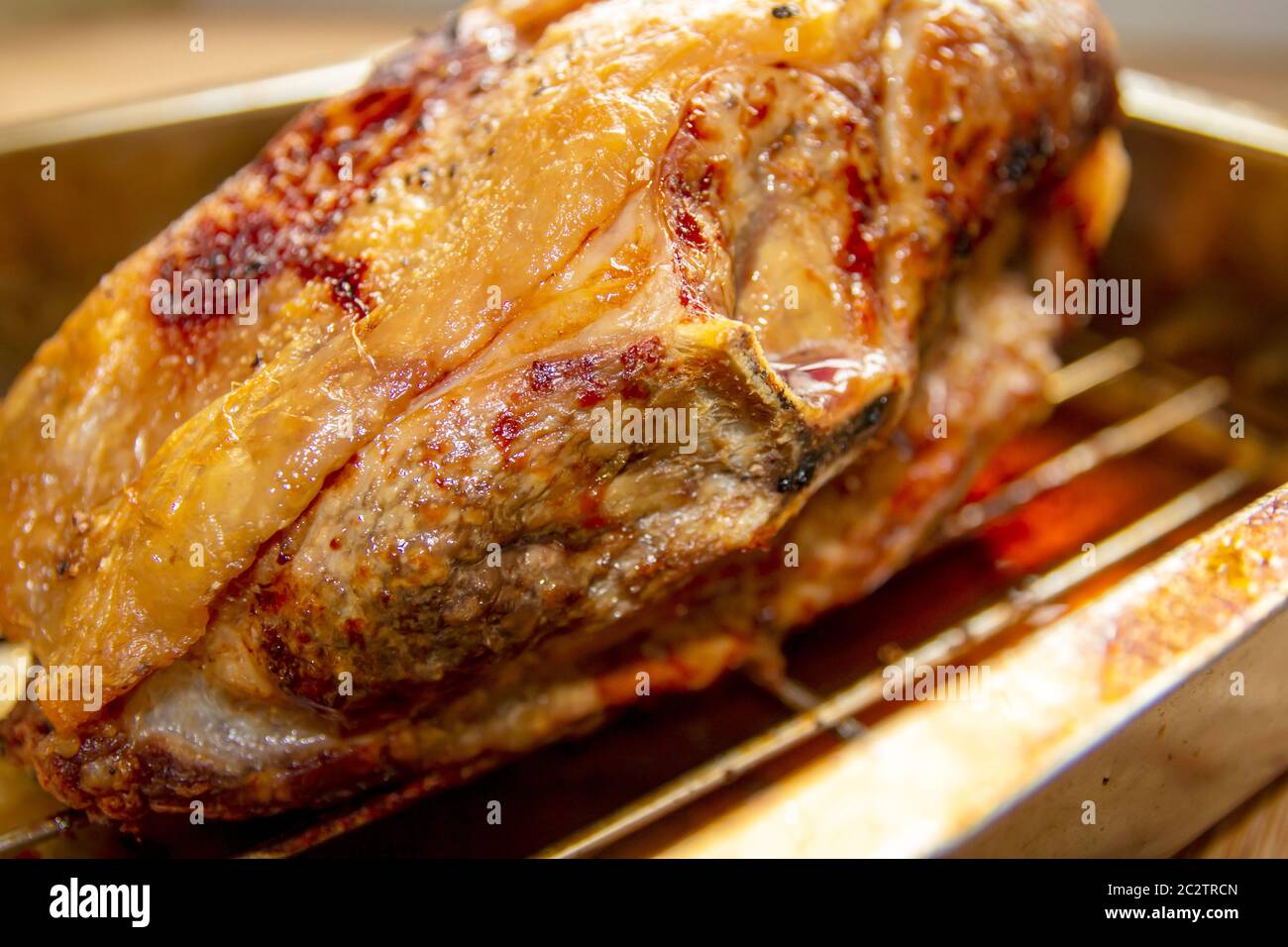 A Roasting Pan with a small Lamb Joint roasted straight out of the oven