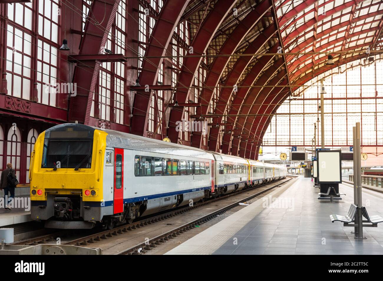 Train on railway station platform, travel in Europe. Transportation by