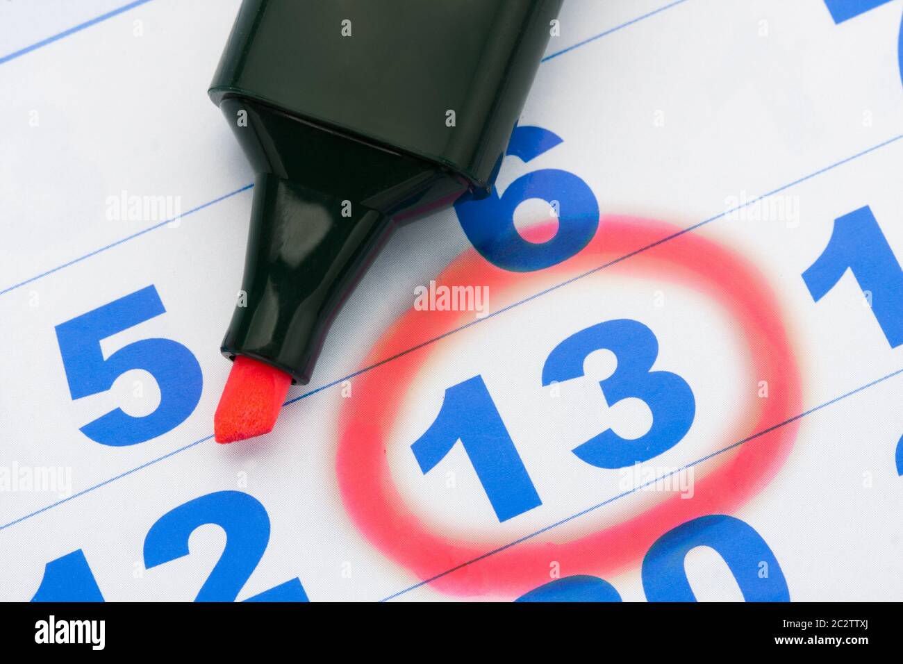 Page of the calendar and red marker Stock Photo - Alamy