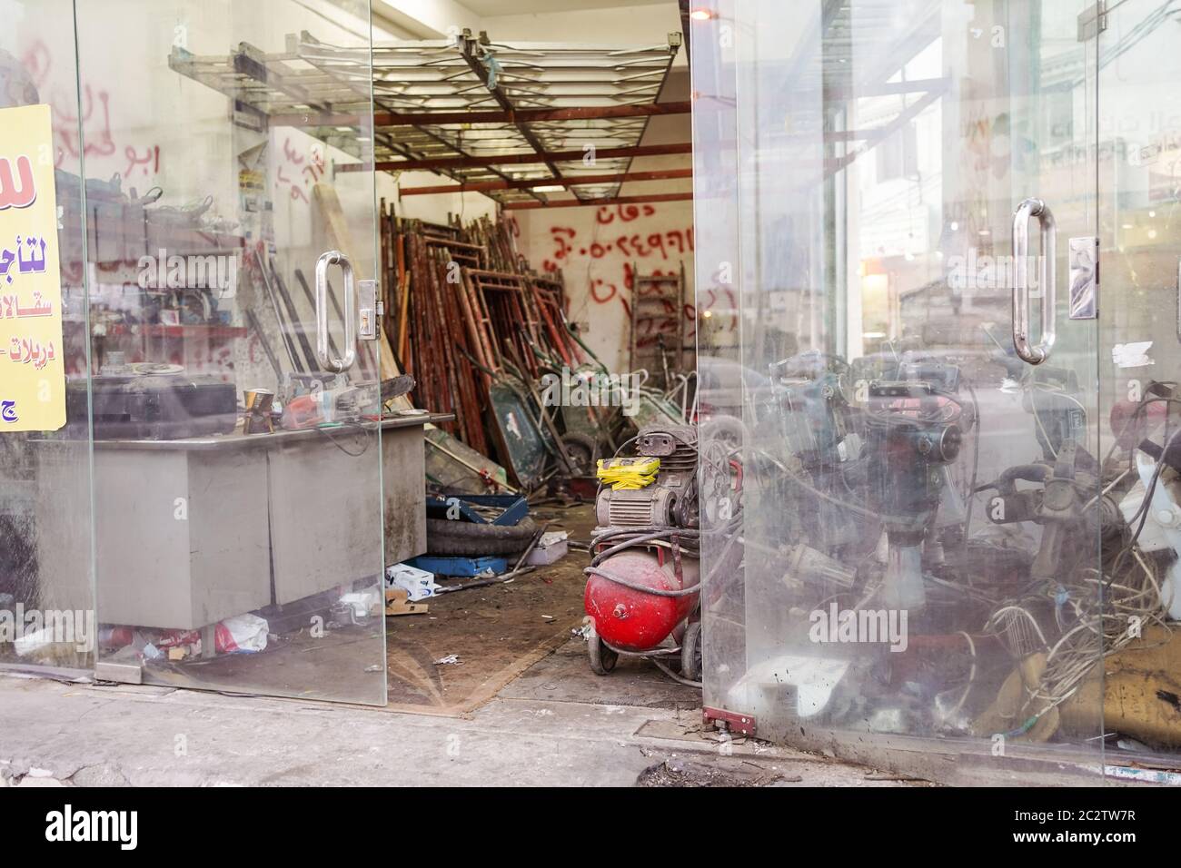 Abha / Saudi Arabia - January 23, 2020: old tousled and broken shop with machines to repair Stock Photo