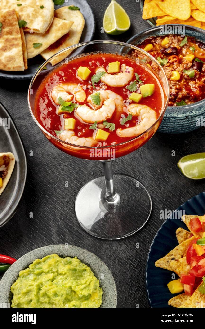 Mexican food, many dishes of the cuisine of Mexico on a black