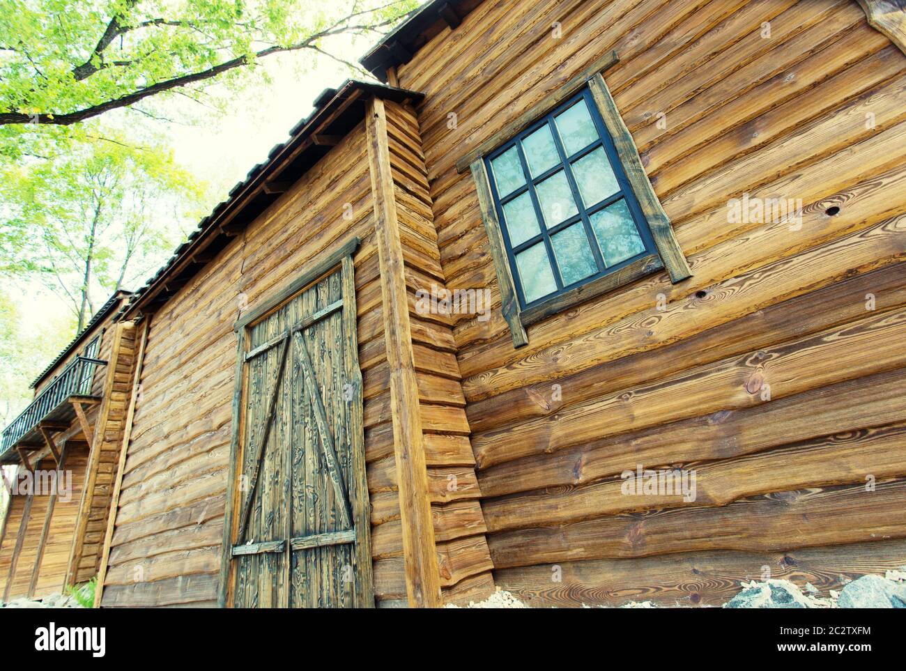 Old wooden barn in forest Stock Photo - Alamy