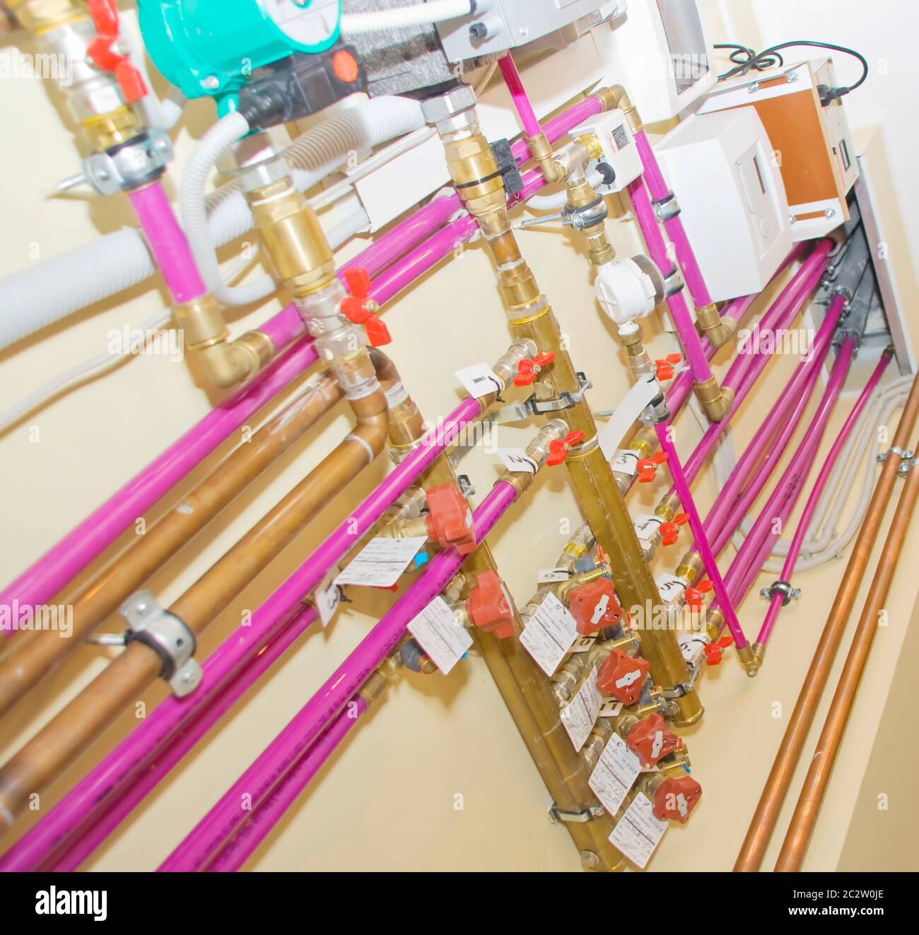 Heating system. Tubes and valves Stock Photo